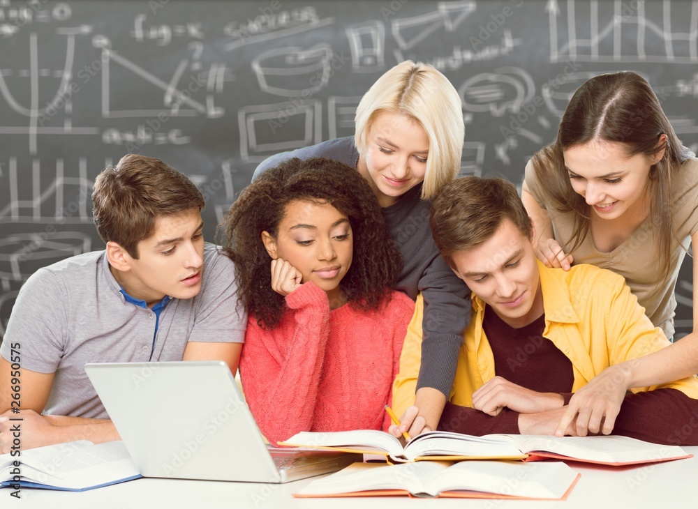 Four Young students studying subject on background