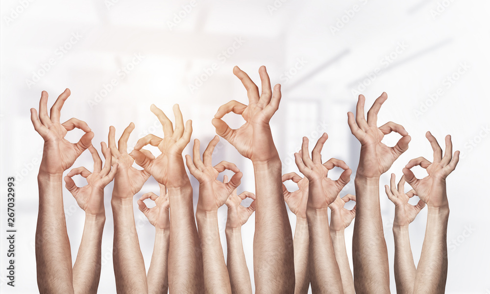 Row of man hands showing okay gesture