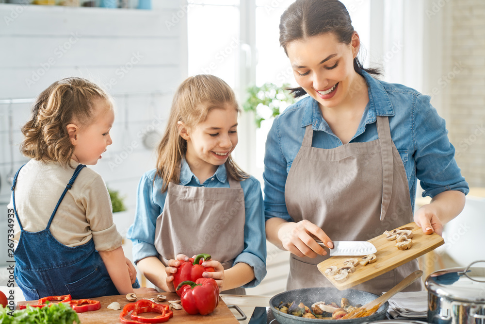 Happy family in the kitchen.