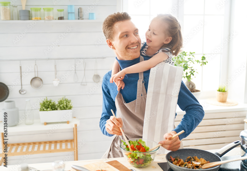 Happy family in the kitchen.