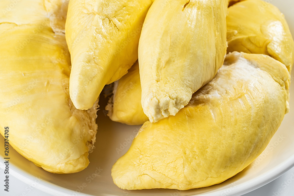 A dish of fresh ripe yellow delicious durian flesh