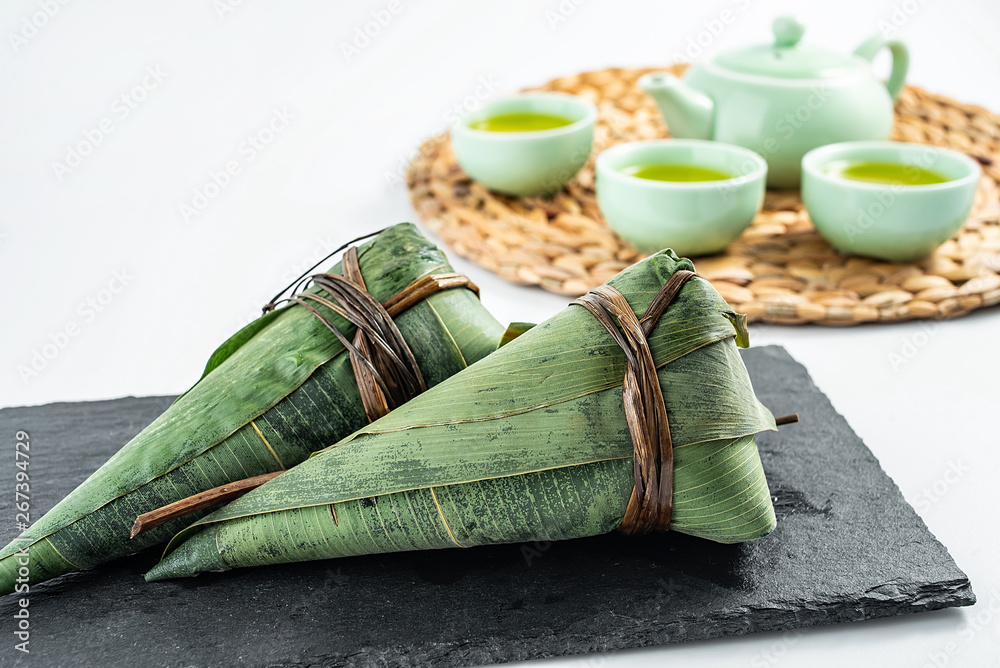 Chinese Dragon Boat Festival traditional food, tea, eating dumplings