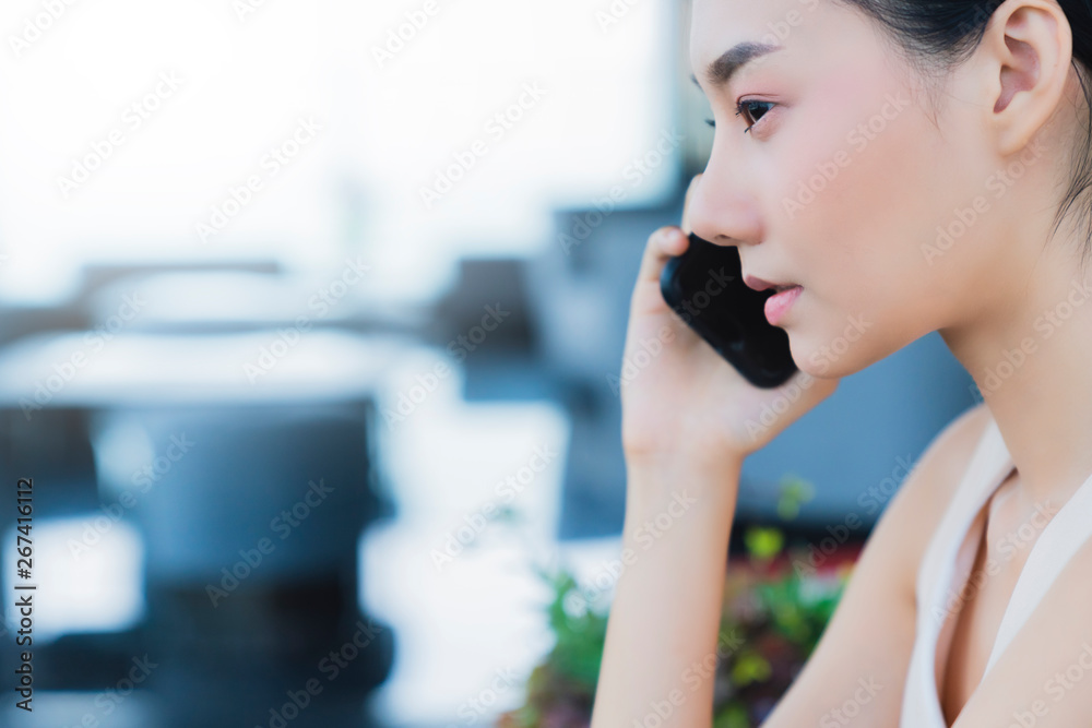 asian businesswoman hand hold smartphone with business discussing business strategy successful ideas