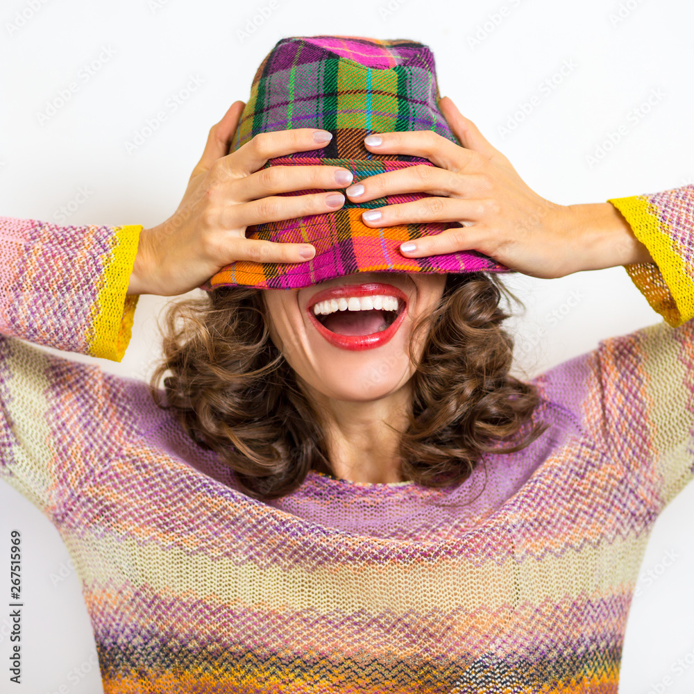 Funny autumn or spring woman laughing with open mouth