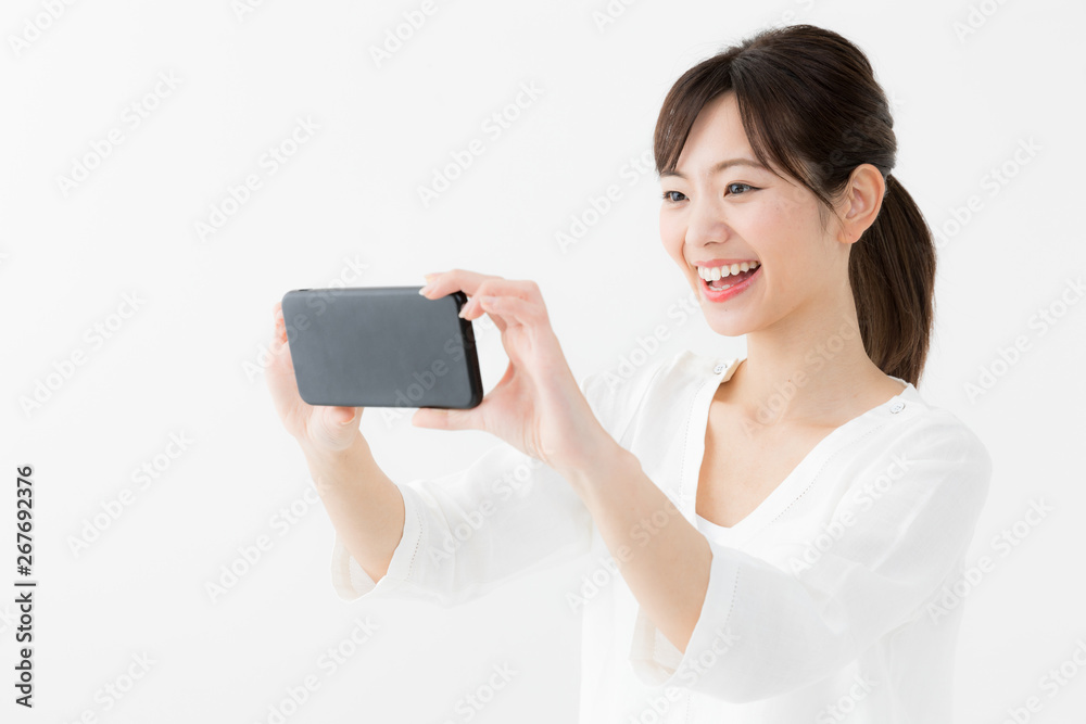 女性　スマートフォン