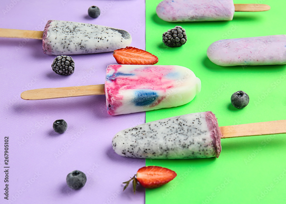 Different fruit ice cream on color background