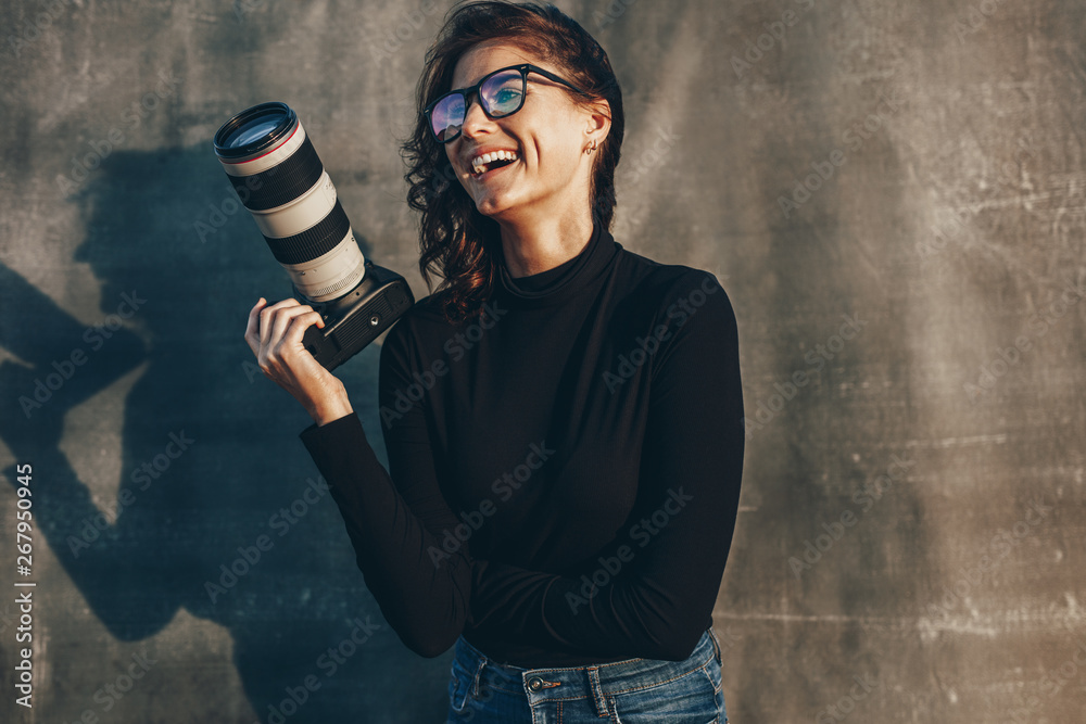 Cheerful young photographer