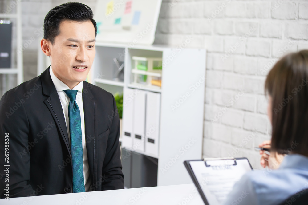 Asian man in job interview