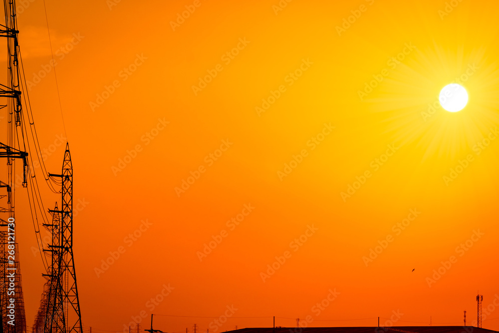 High voltage electric pole and transmission lines in the evening. Electricity pylons at sunset. Powe