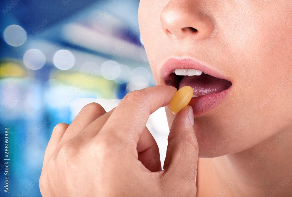 Close up on a beautiful girl while enjoying  gum