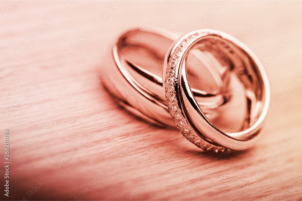 Engagement rings on background close up