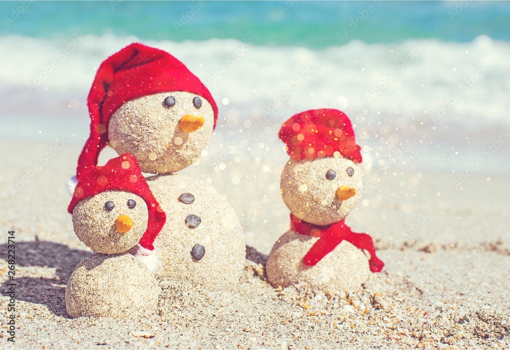 Sandy snowmen. Holiday concept can be used