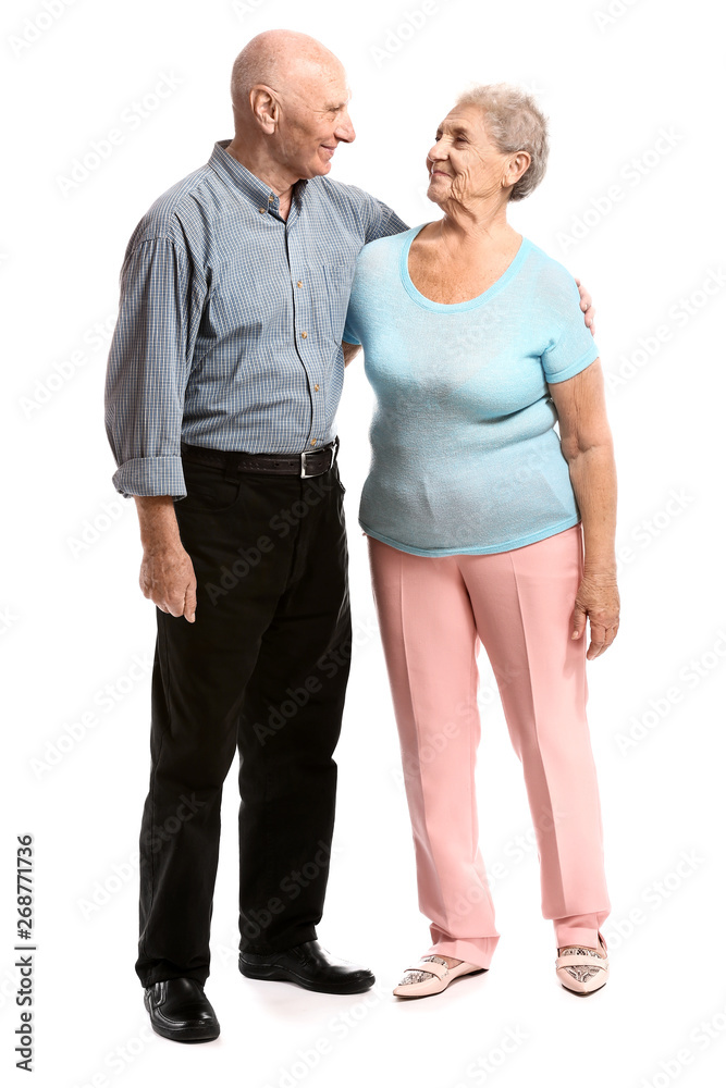 Portrait of senior couple on white background