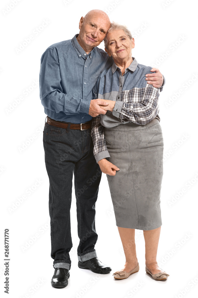 Portrait of senior couple on white background