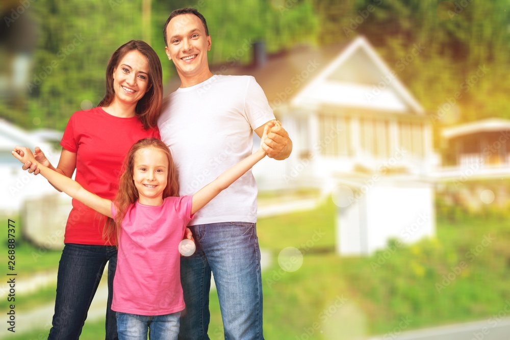 Portrait of Happy Family with Daughter