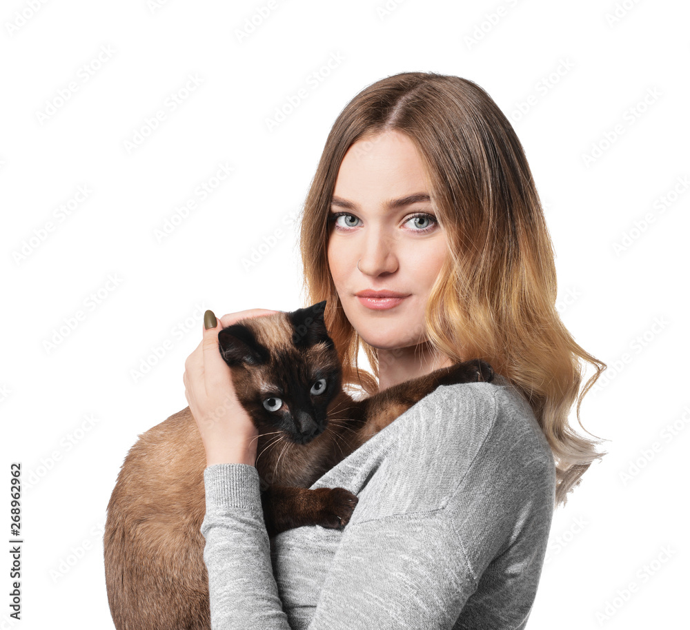 Young woman with cute Thai cat on white background