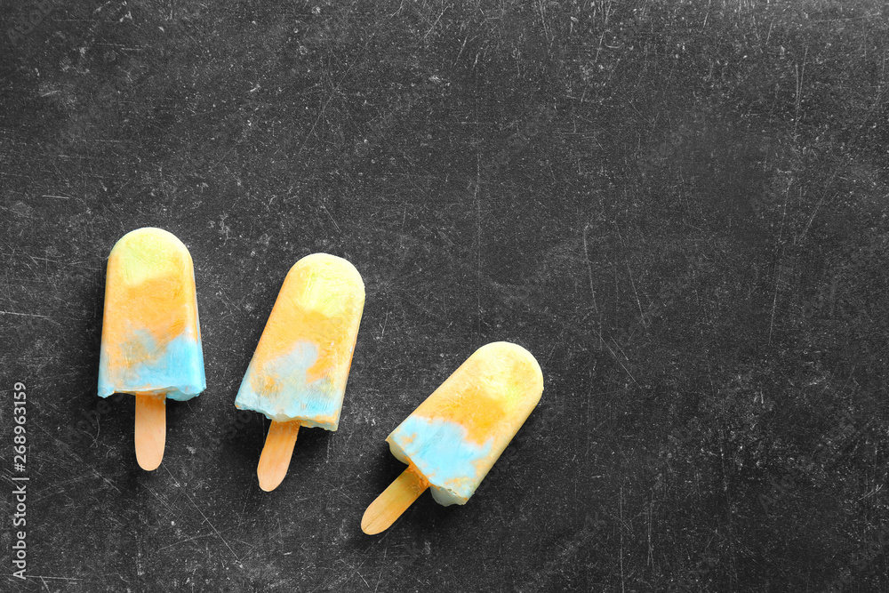 Tasty ice cream on dark background