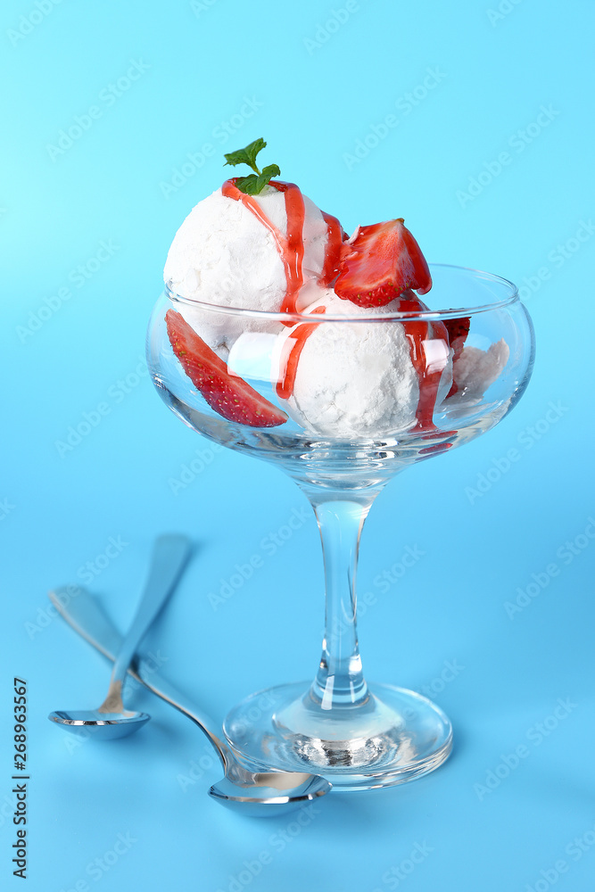 Glass bowl with tasty ice cream on color background