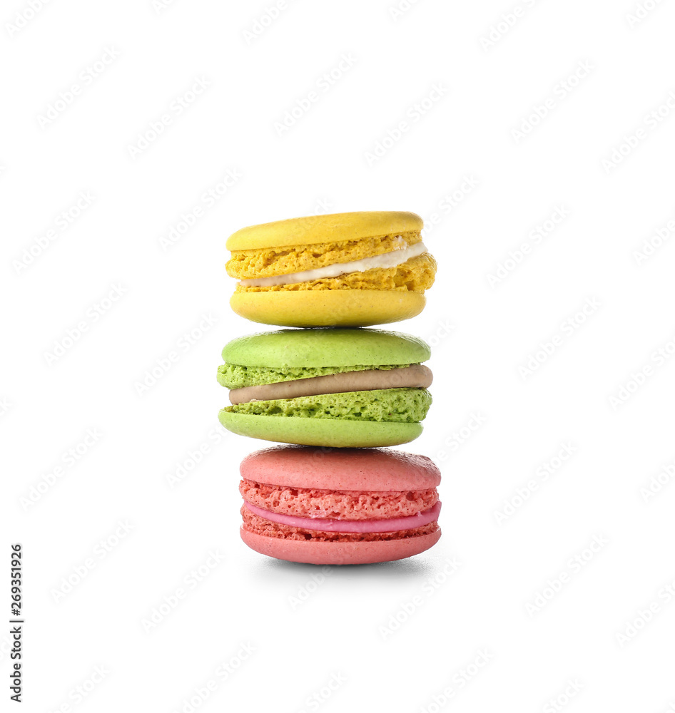 Tasty macarons on white background