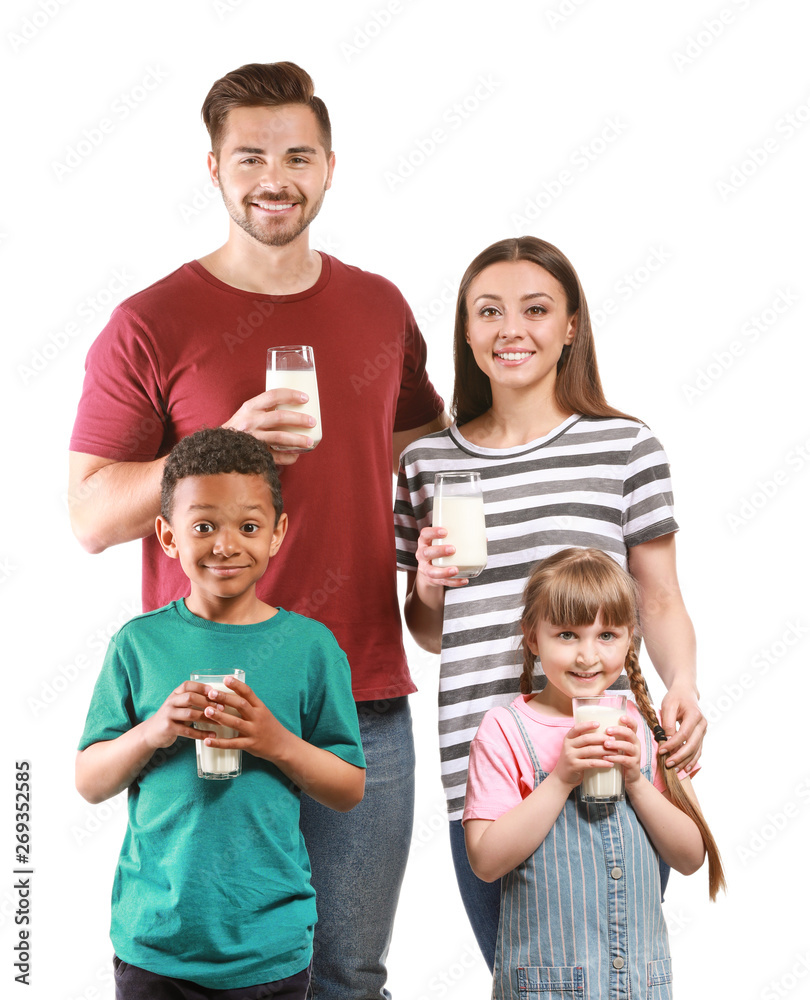 Young family with glasses of tasty milk on white background