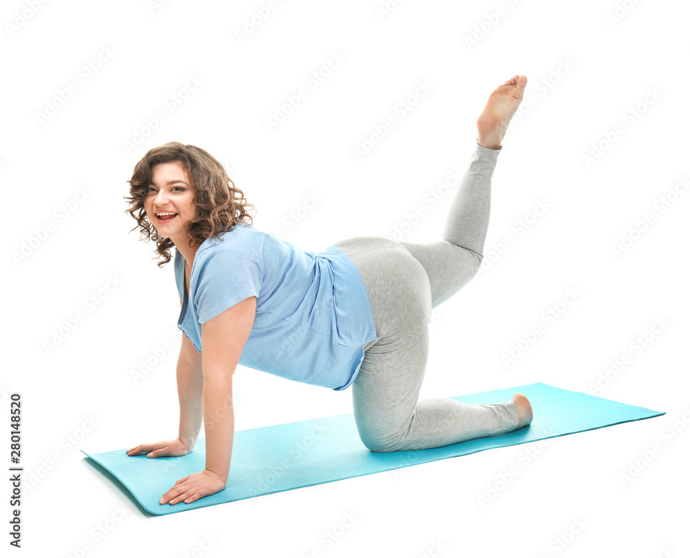 Overweight woman training on white background