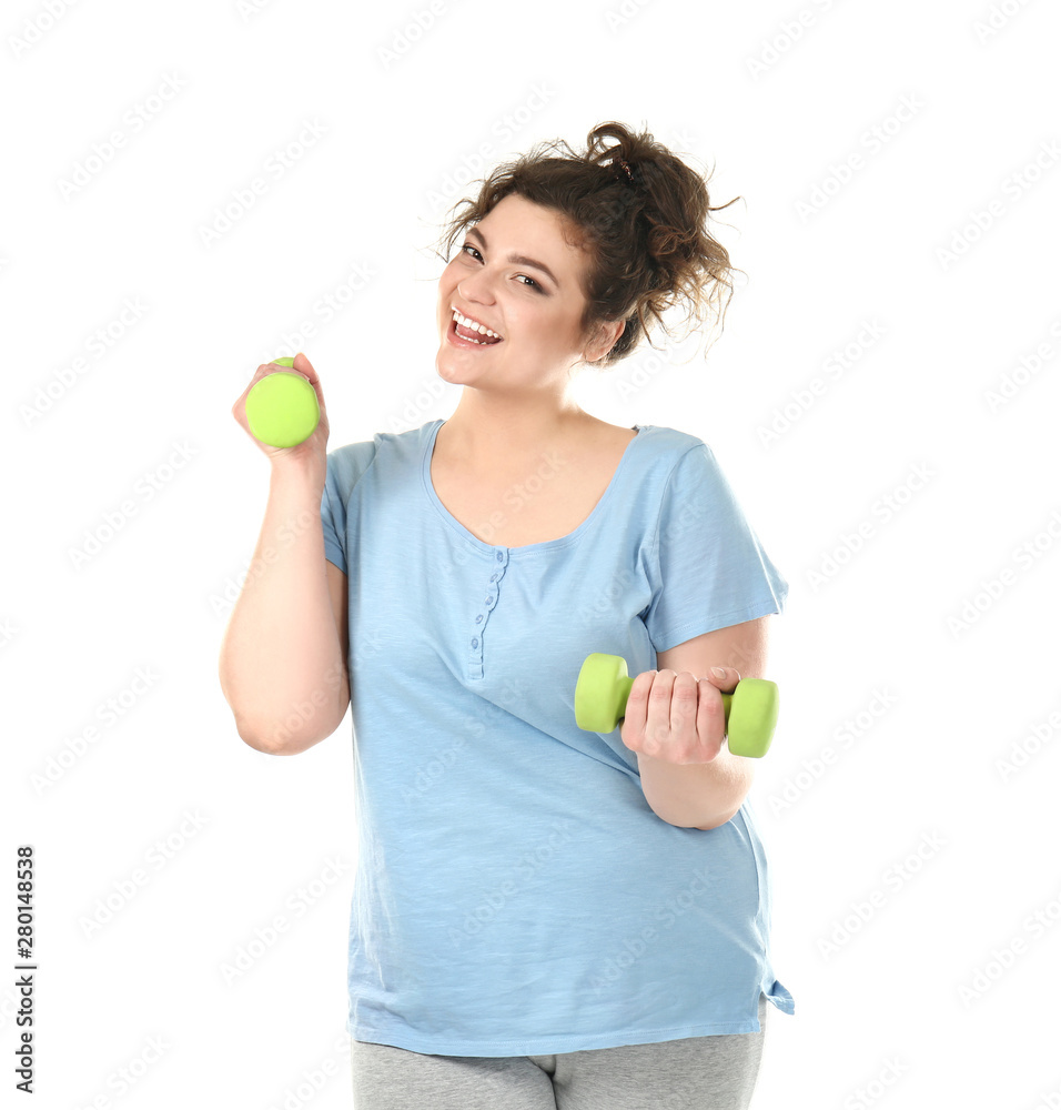 Overweight woman with dumbbells on white background