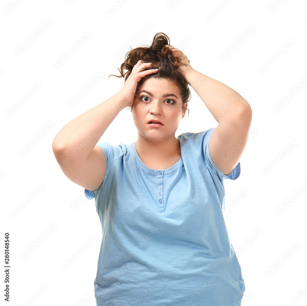 Stressed overweight woman on white background