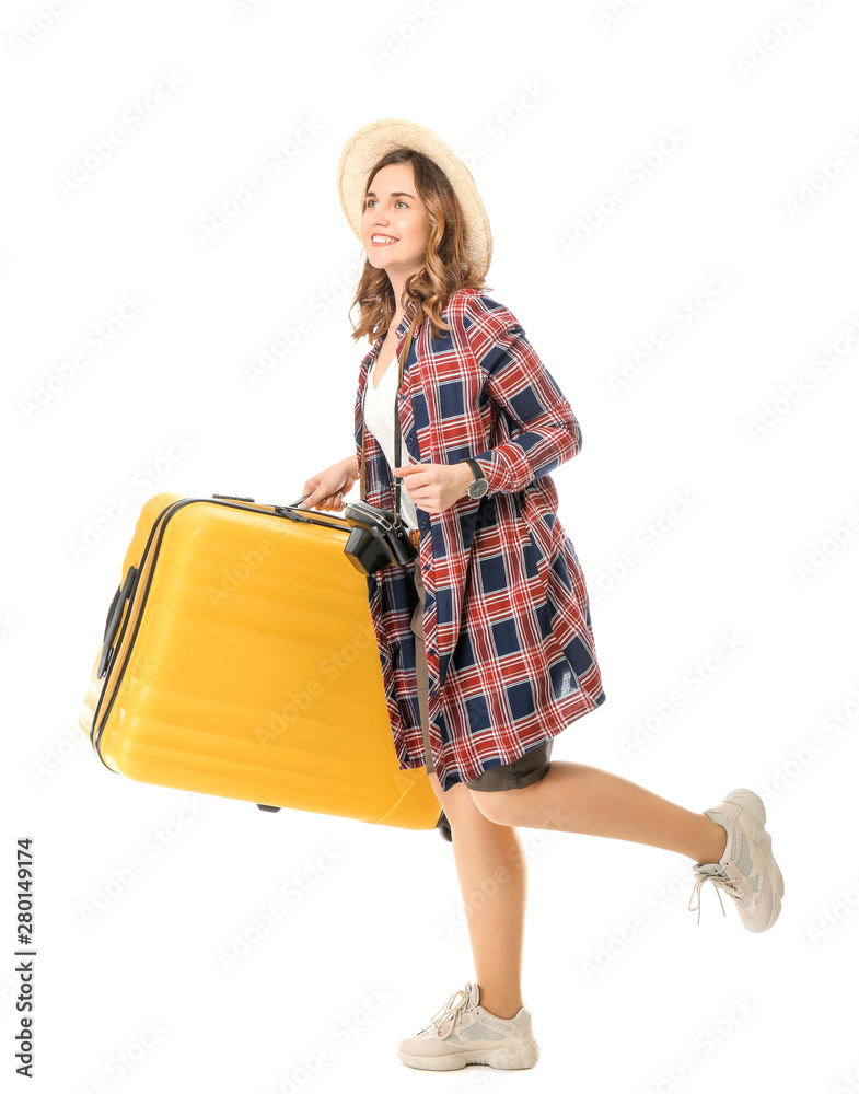 Female tourist with luggage on white background