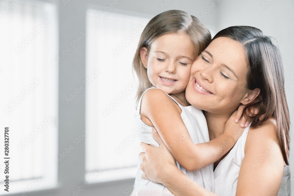 Happy Mother and daughter hugging