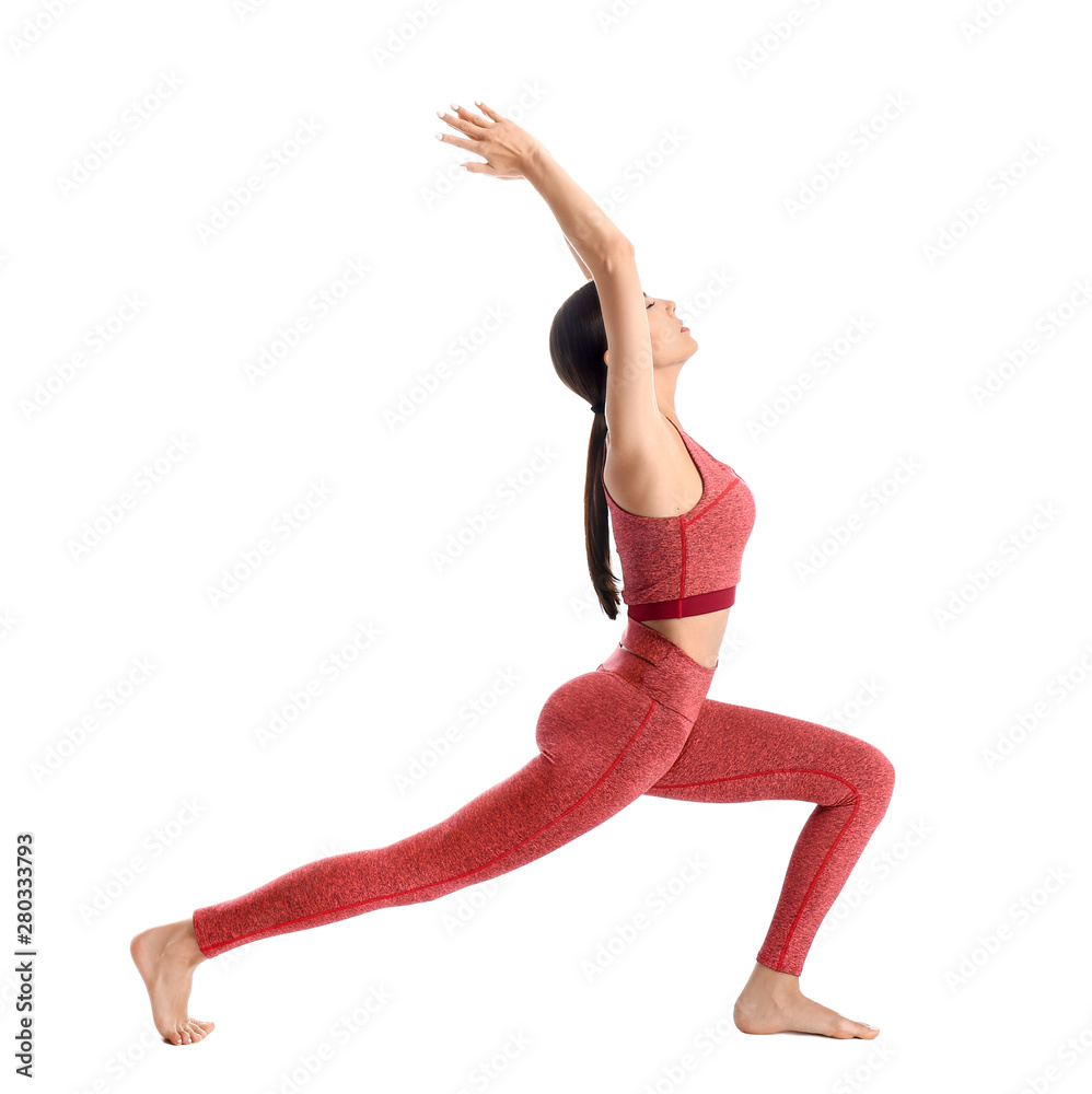 Sporty woman practicing yoga on white background