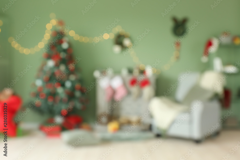 Interior of beautiful room decorated for Christmas, blurred view