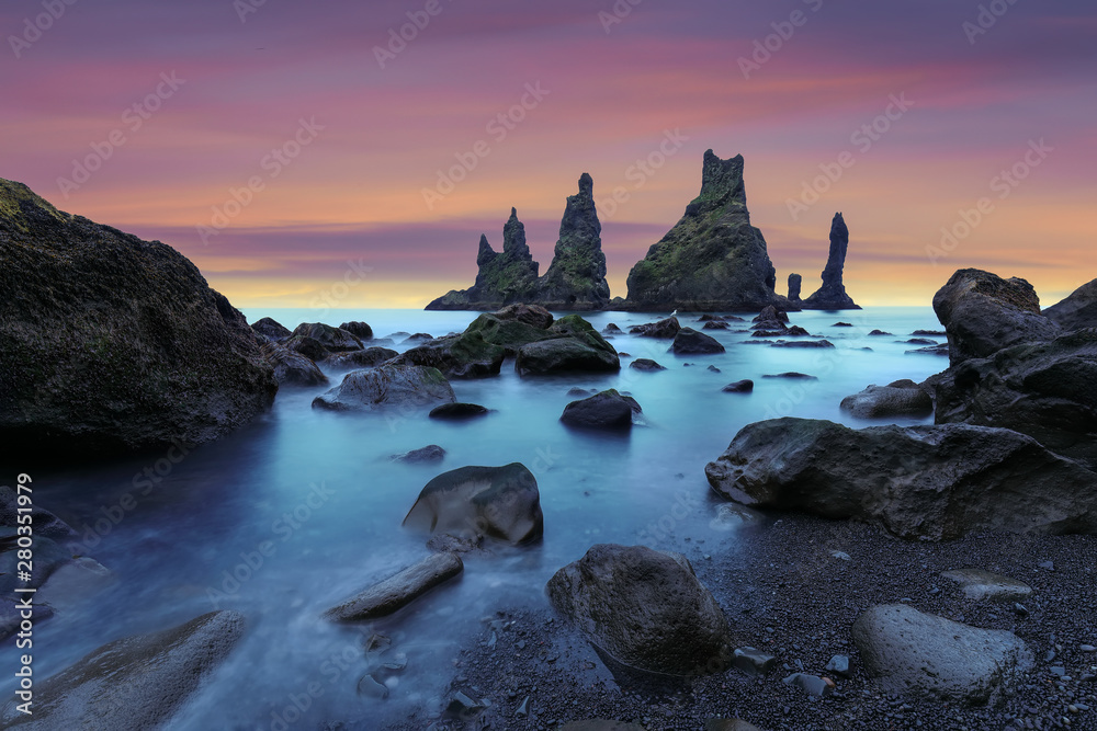 Amazing landscape with basalt rock formations Troll Toes on Black beach Reynisfjara near the village