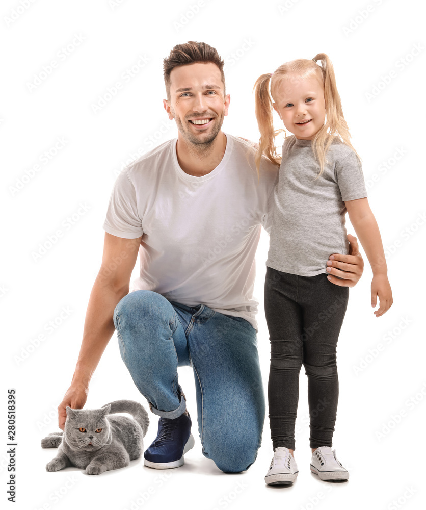 Happy father and daughter with cute cat on white background