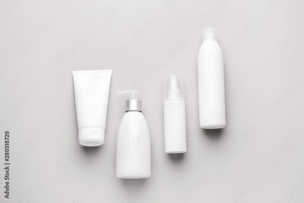 Set of cosmetic products on light background