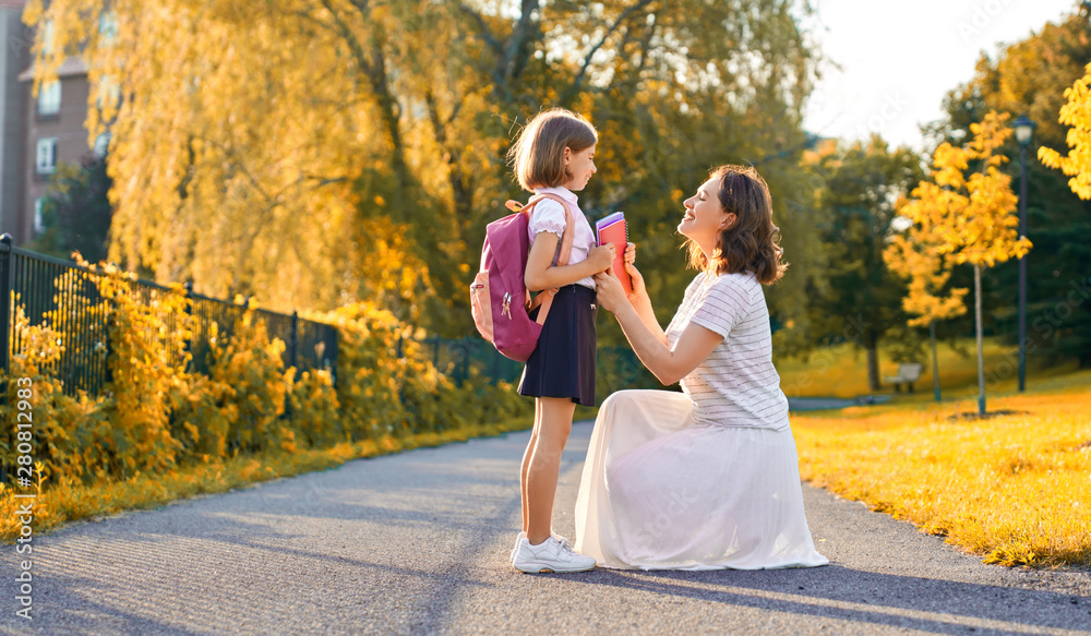 Parent and pupil go to school