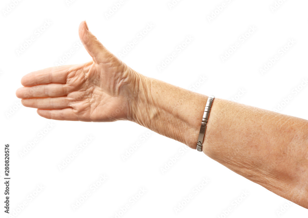 Hand of elderly woman on white background