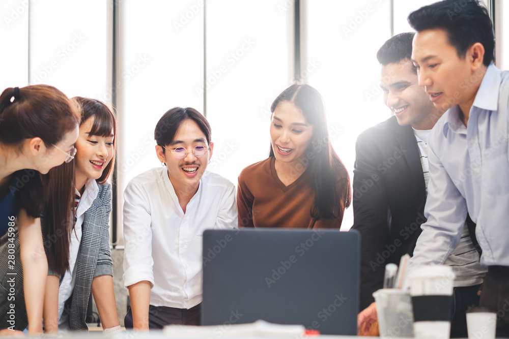 Group of Asian business people and creative designer meeting in office