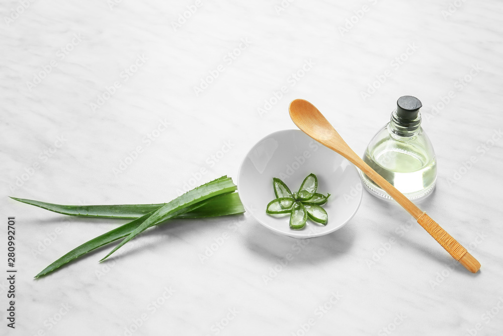 Composition with aloe vera juice on light background