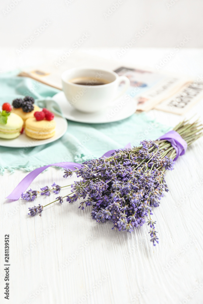 Beautiful lavender flowers on white table