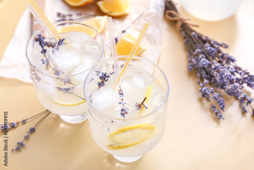 Glasses with lavender lemonade on table