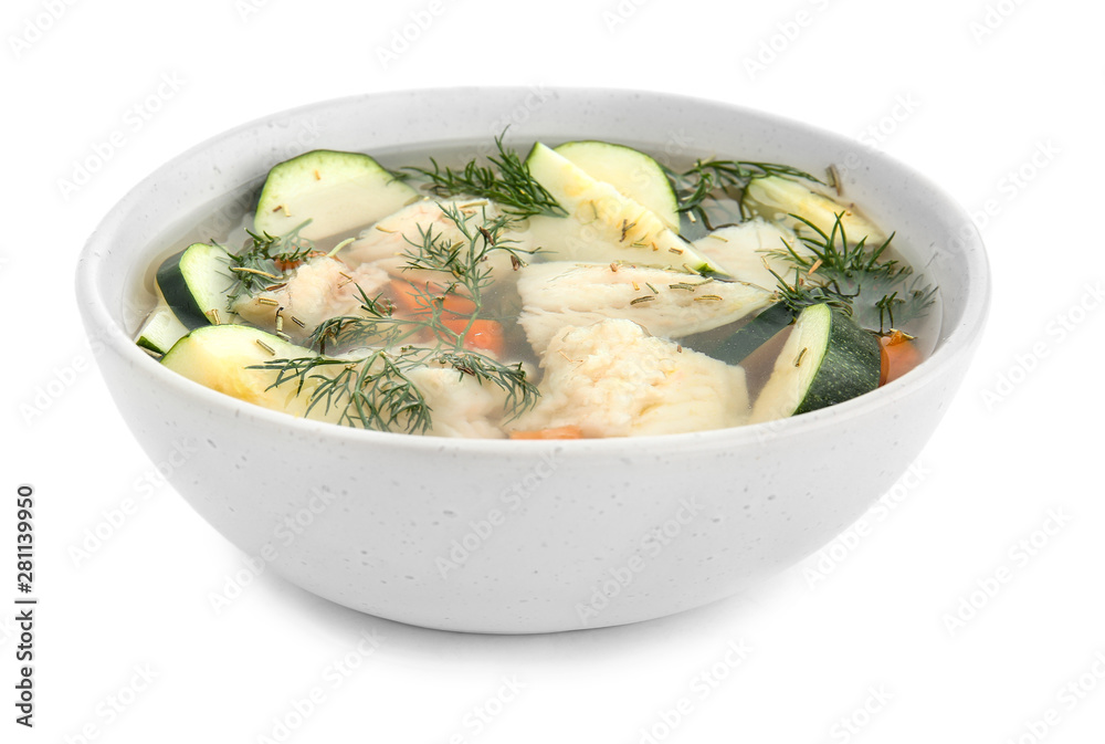 Bowl of tasty soup on white background