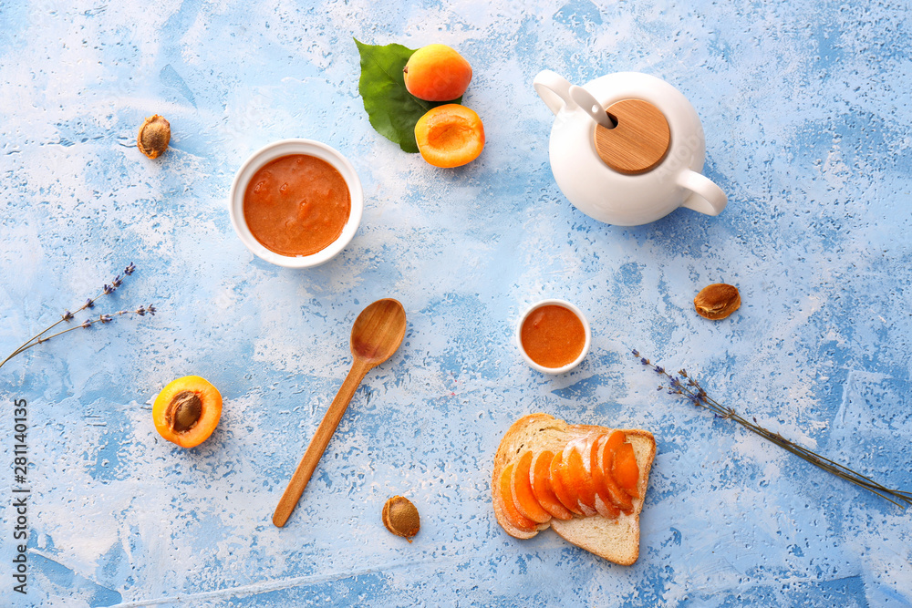 Tasty apricot jam on color background