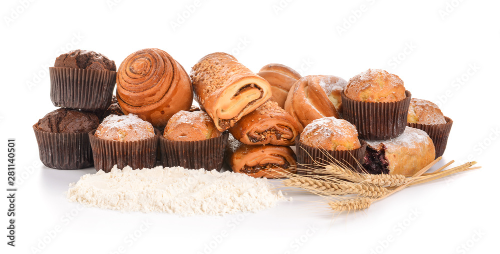 Heap of tasty pastries on white background