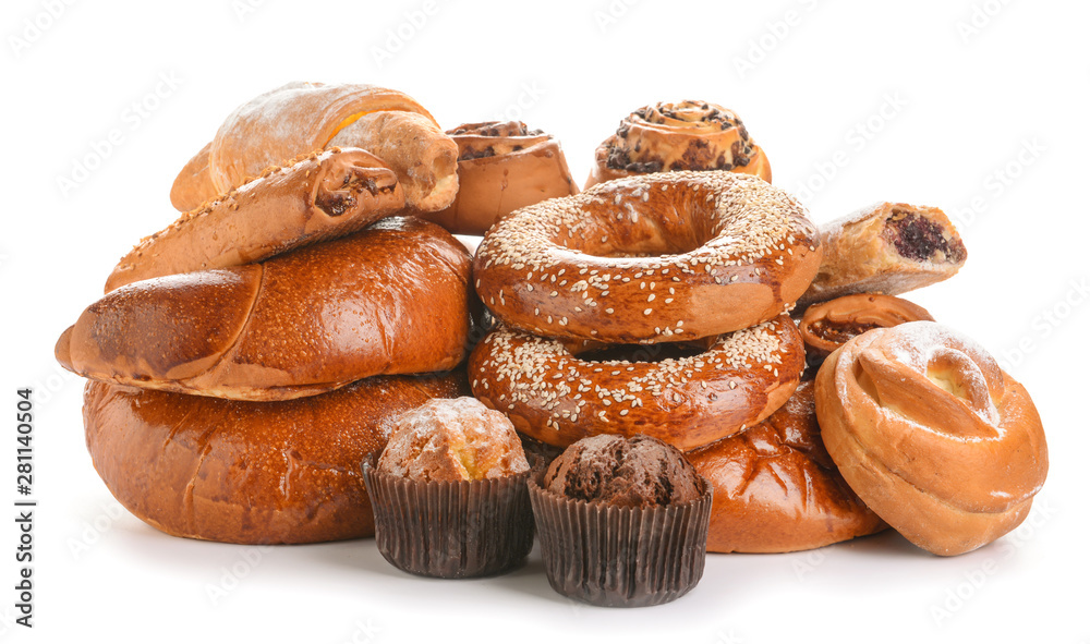 Heap of tasty pastries on white background