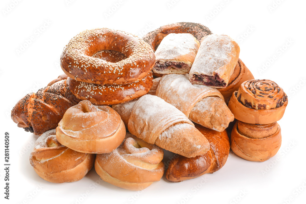 Heap of tasty pastries on white background