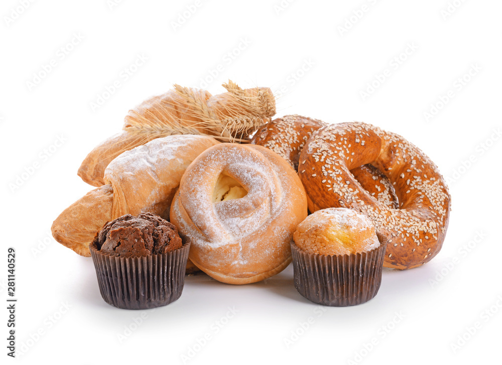 Heap of tasty pastries on white background