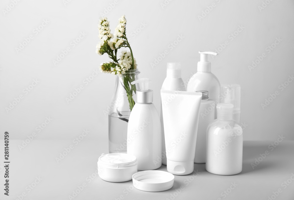 Set of cosmetic products on light background