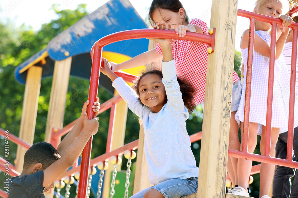 Cute little children on playground outdoors