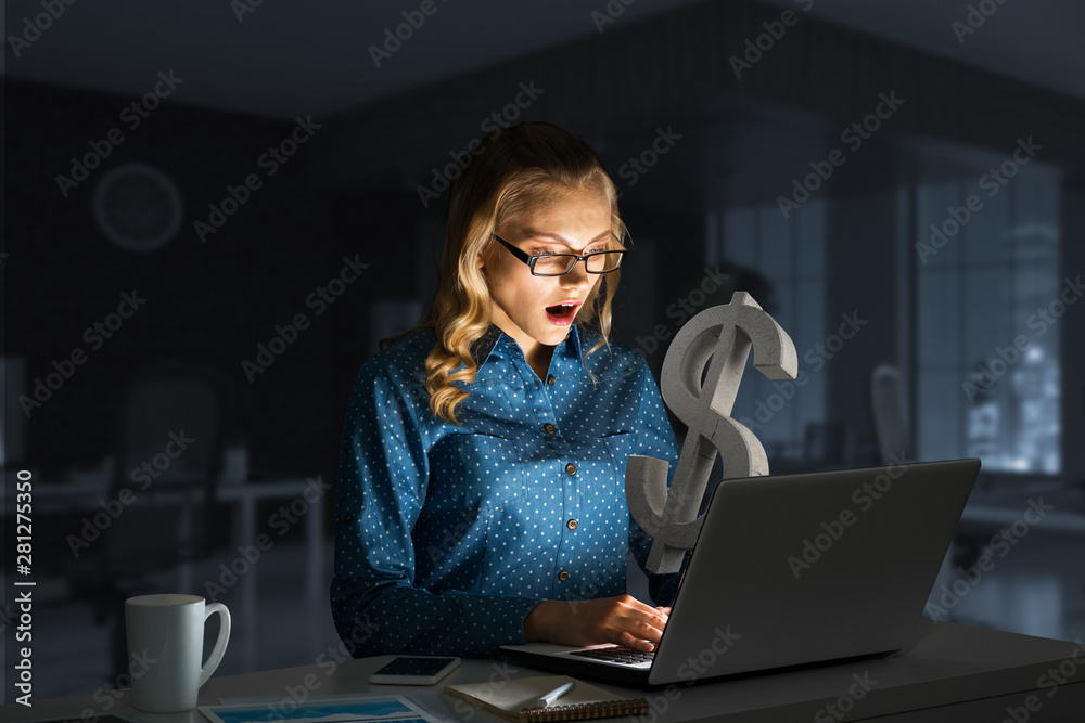 Attractive blonde wearing glasses in dark office using laptop. Mixed media