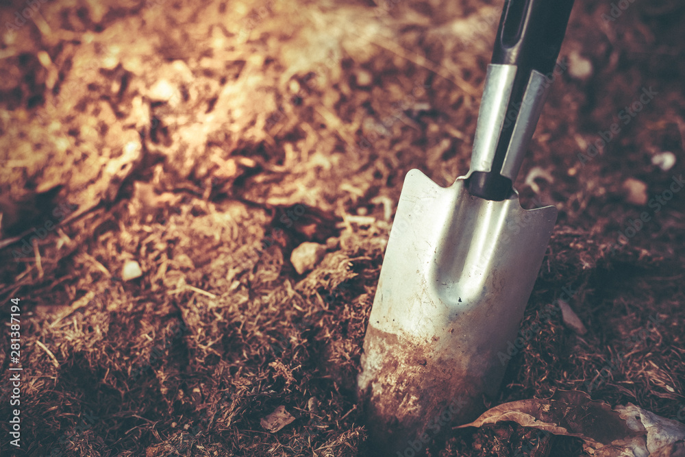 Trowel for planting soil,Shovel on soil backgound,Small garden shovel